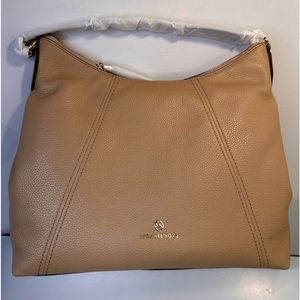 Make: Michael Kors Brand New purse without tags.